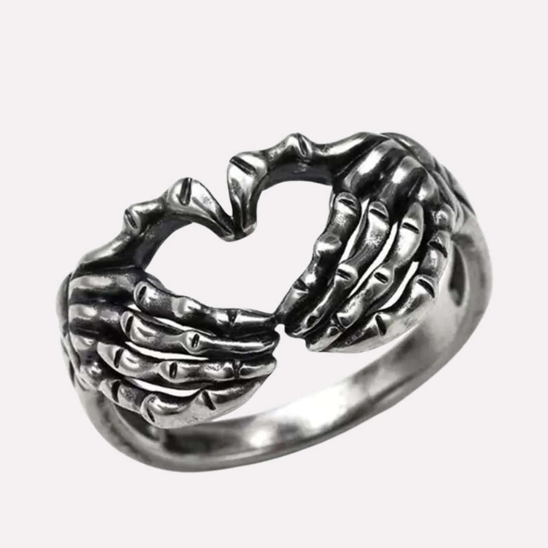 Skeleton Hands forming a heart-shaped ring symbolizing unique love | Aloha Imports.