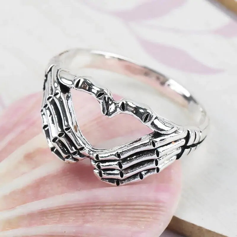 Unisex Heart Ring with Gothic Skeleton Fingers detail | Aloha Imports.